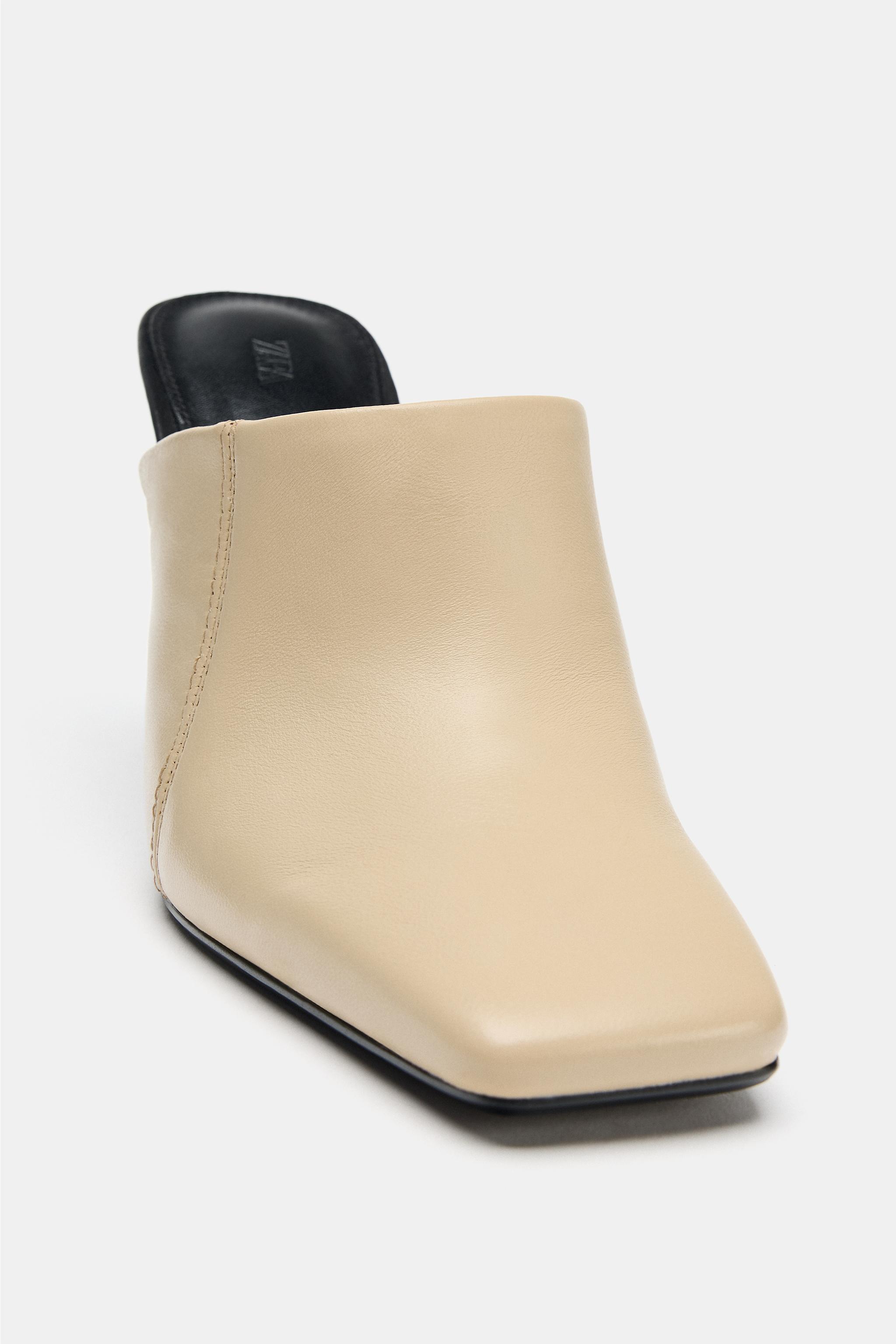 MULES À TALONS EN CUIR LIMITED EDITION